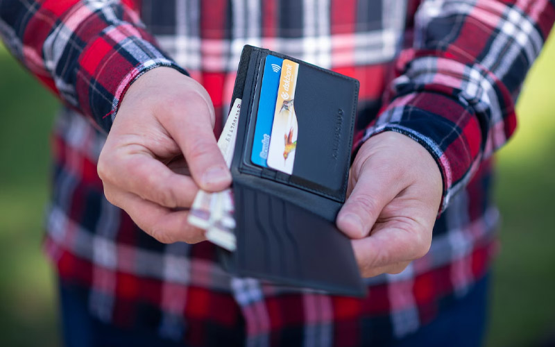 5 Worst Items to Retain in Your Wallet, Experts Warn Habits & Routines